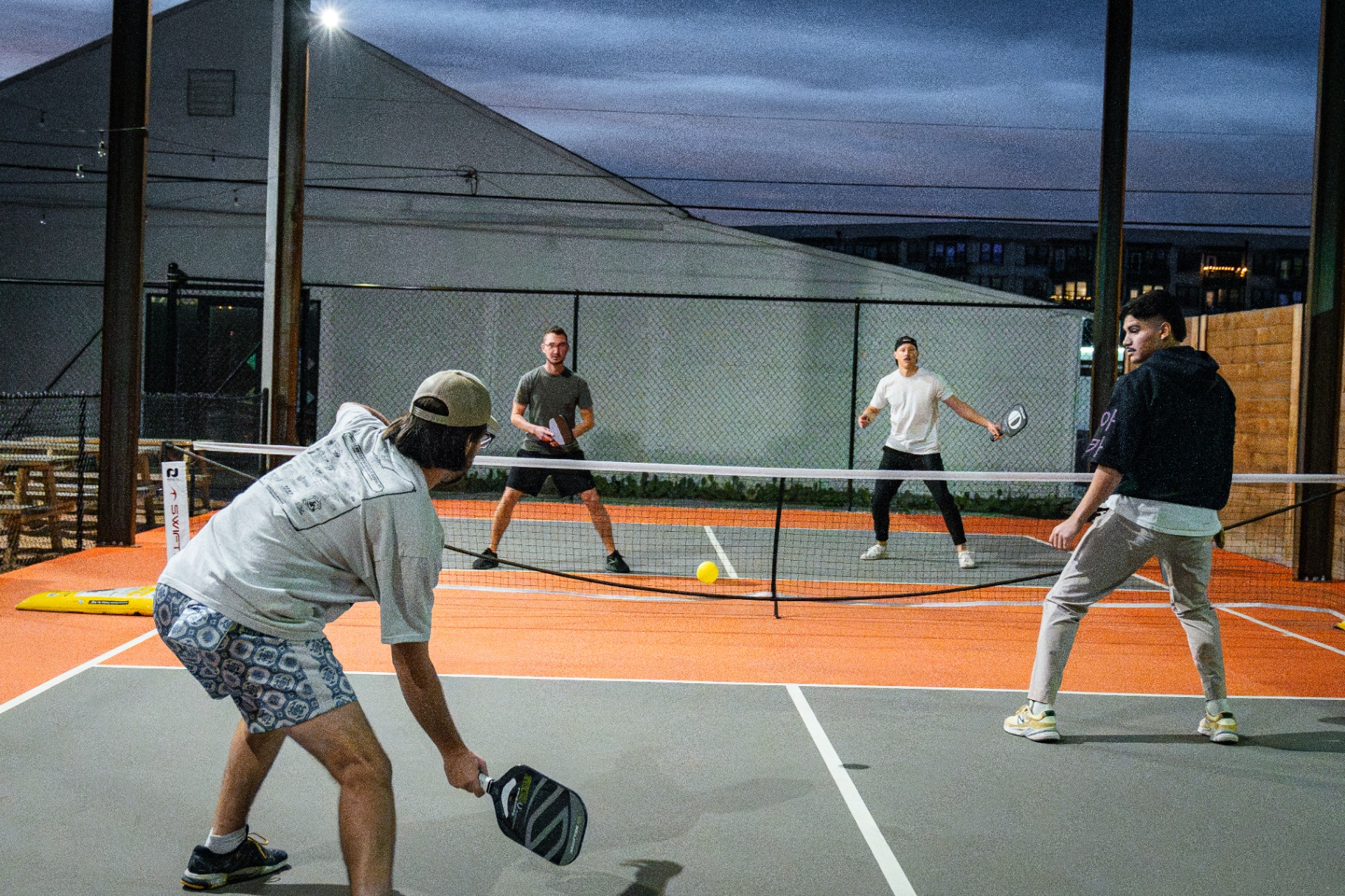 Doubles pickleball match at Ants Beer Cave in Austin